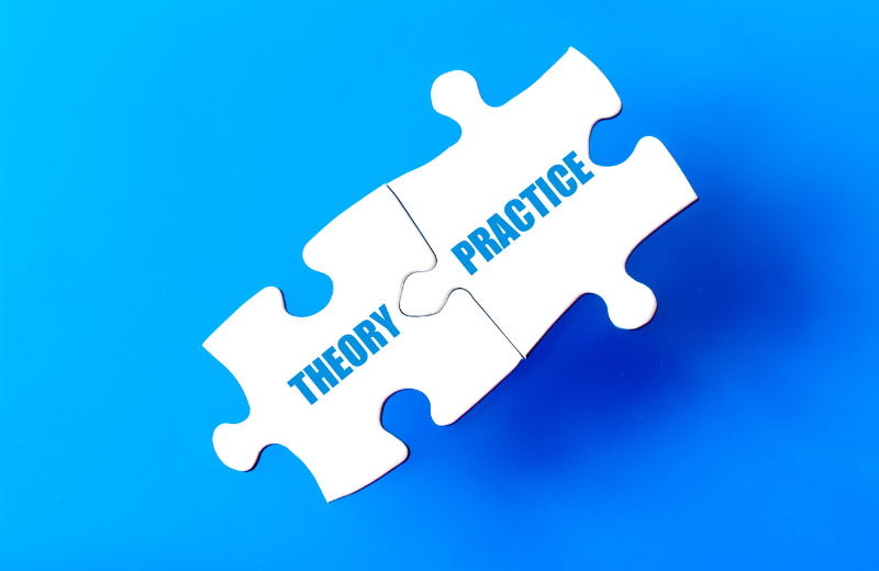 Image of a jigsaw saying 'theory' and 'practice'