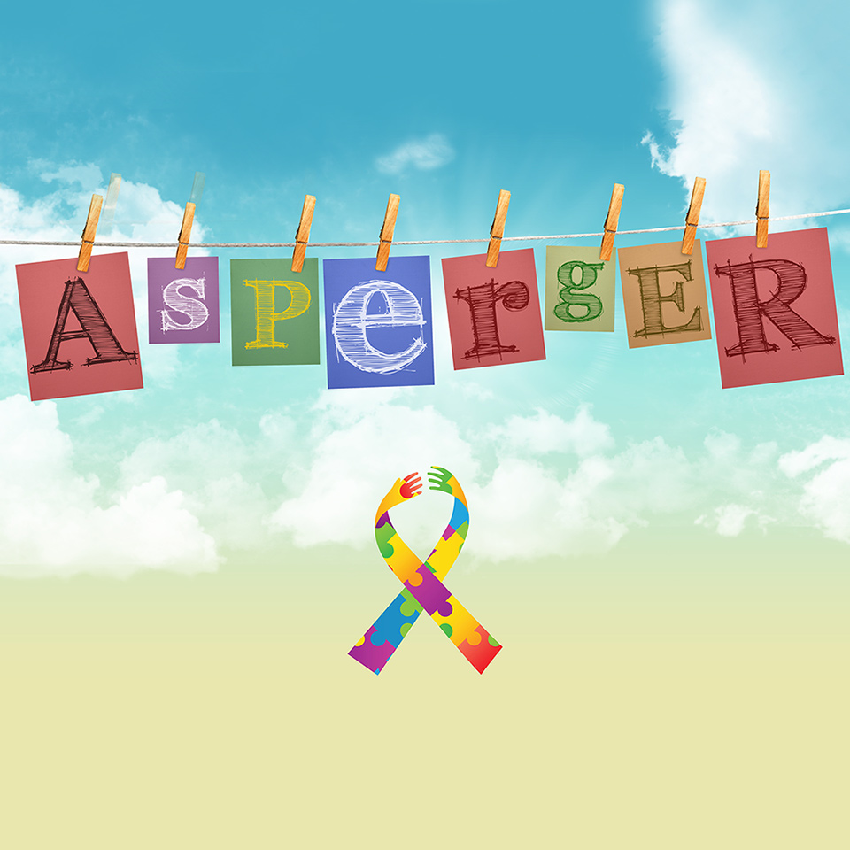 The word 'Asperger' on a washing line above the Autism ribbon symbol