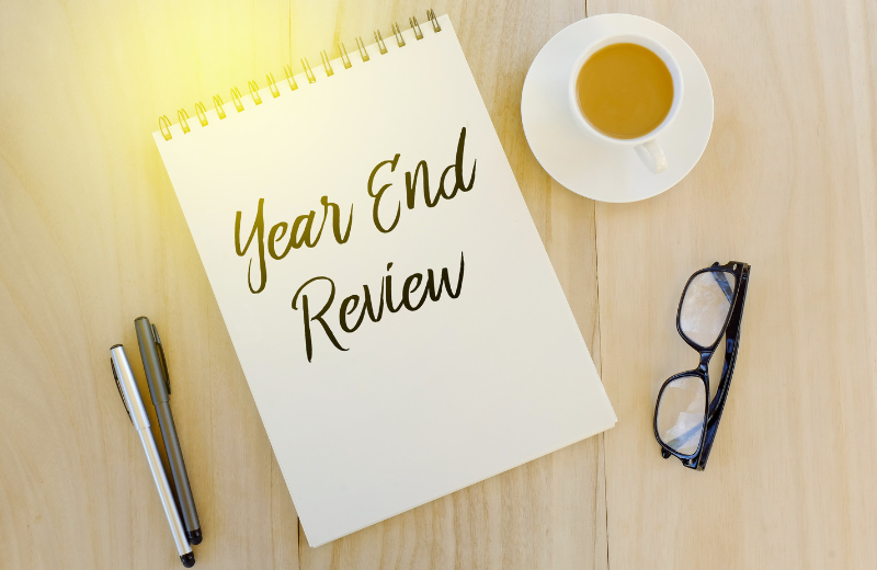 Image of a notepad that says 'Year End Review'