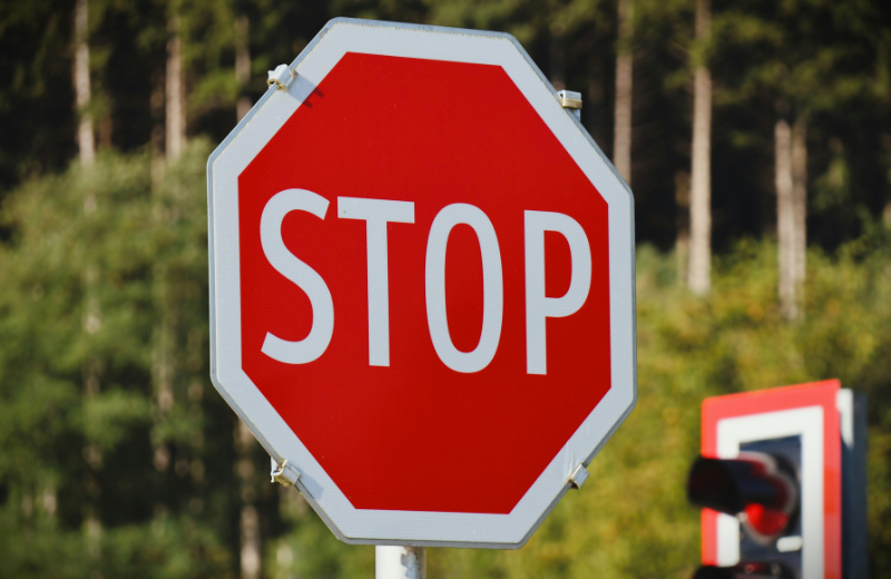Image of a stop warning sign.