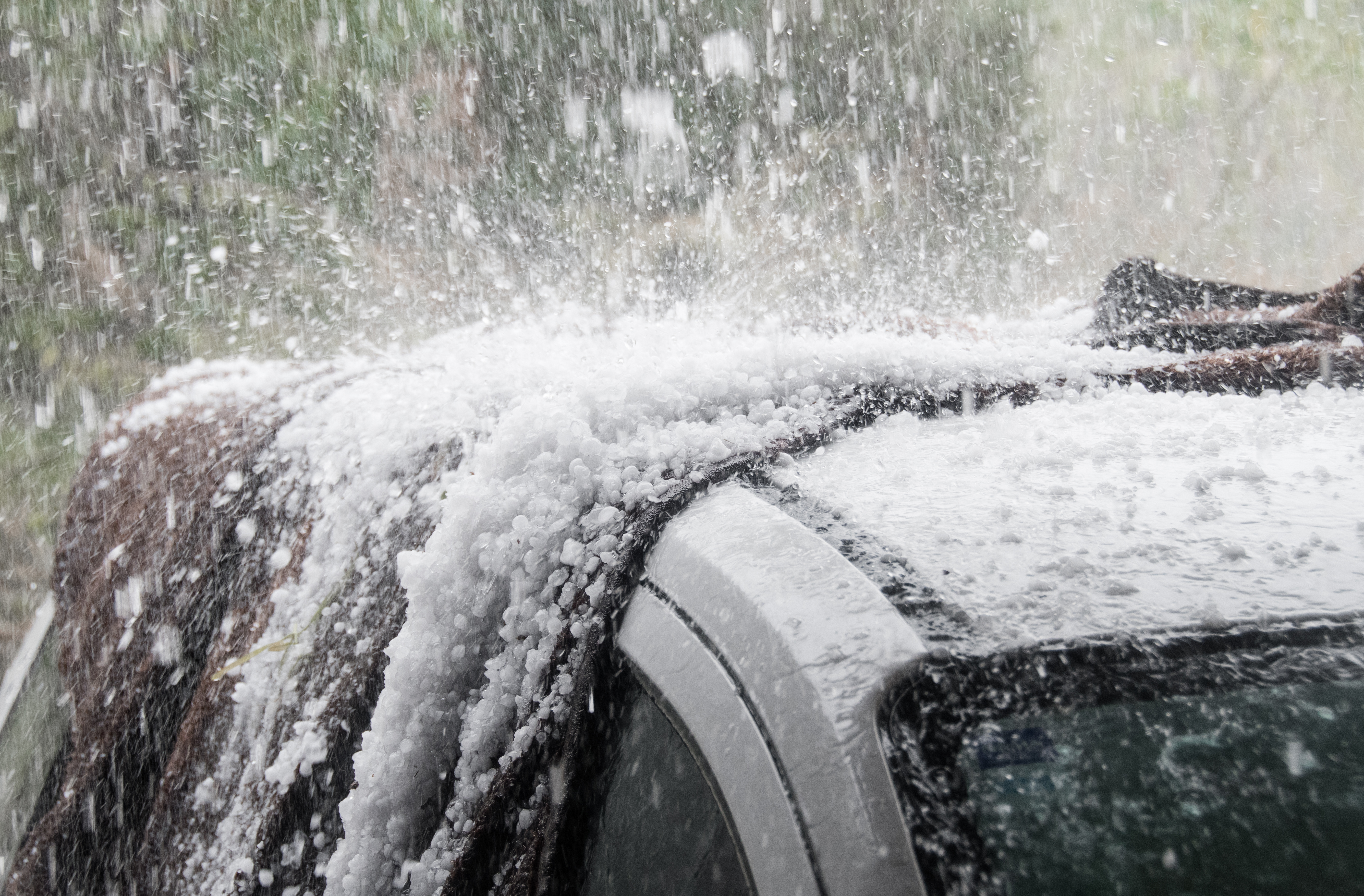 Hailstorm damaging car