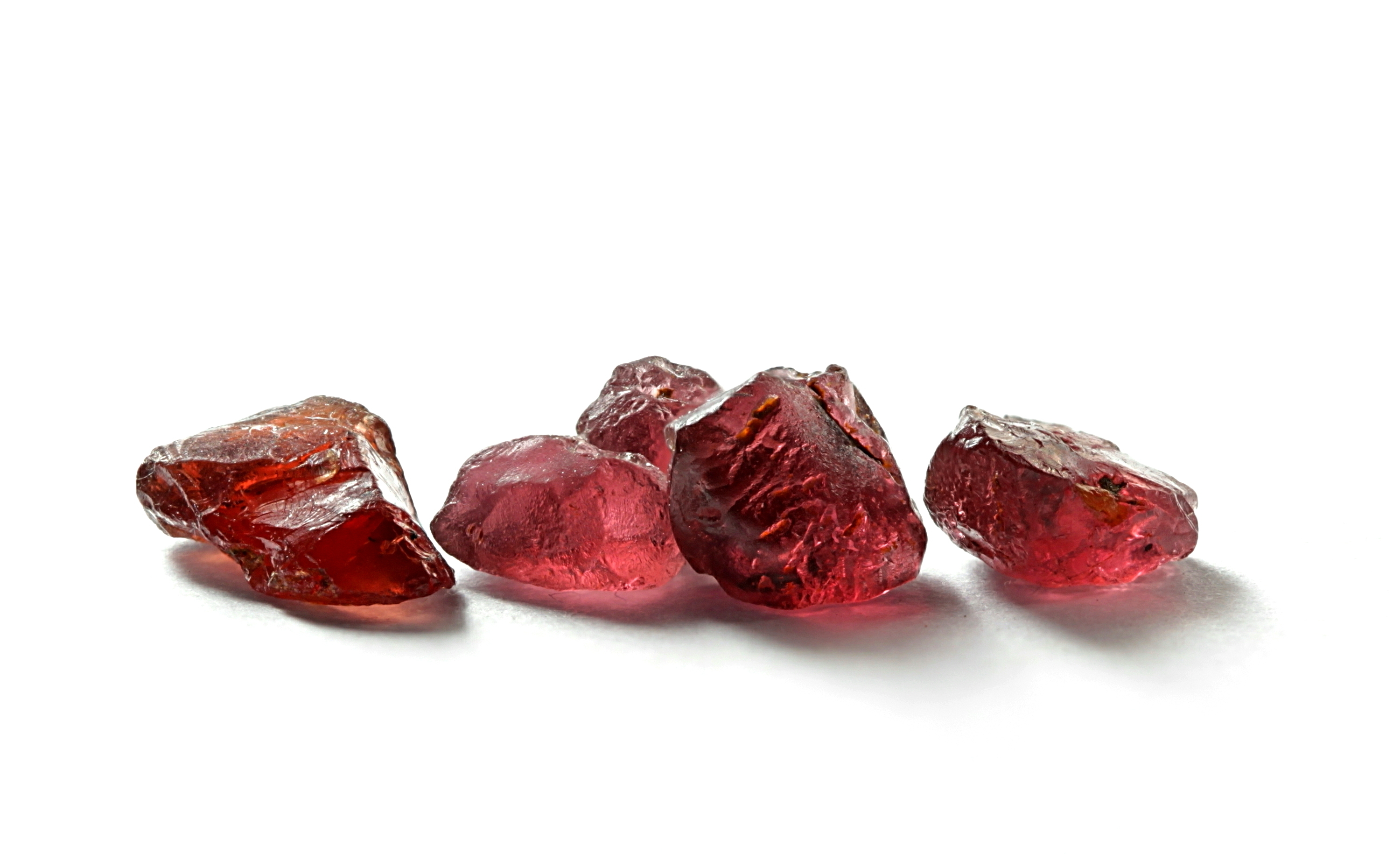 Multiple pieces of Garnet on a white background