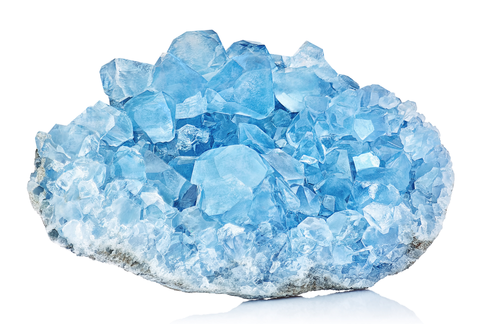 A raw piece of Celestite on a white background