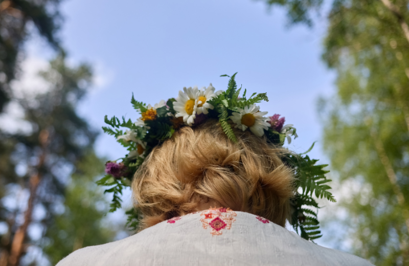 Image of someone wearing a flower crown.