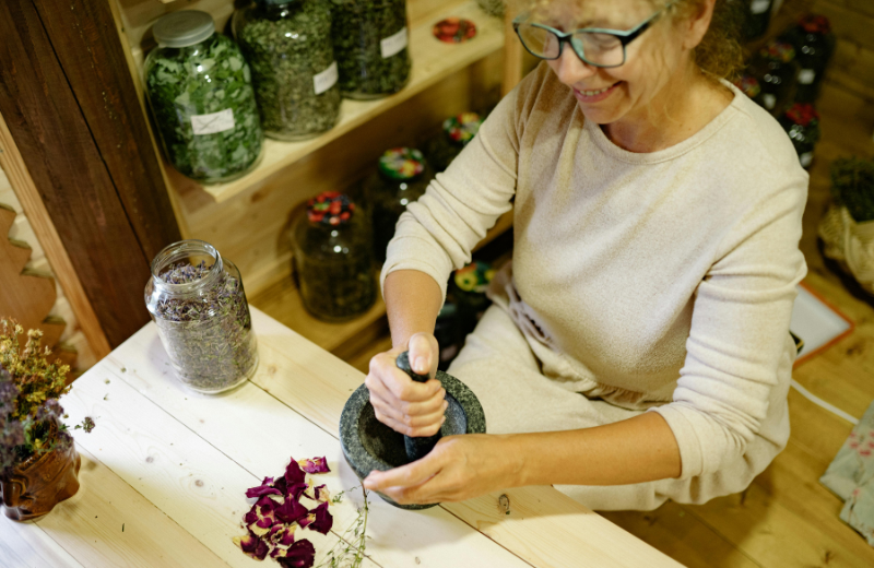 Image of someone grinding herbs.