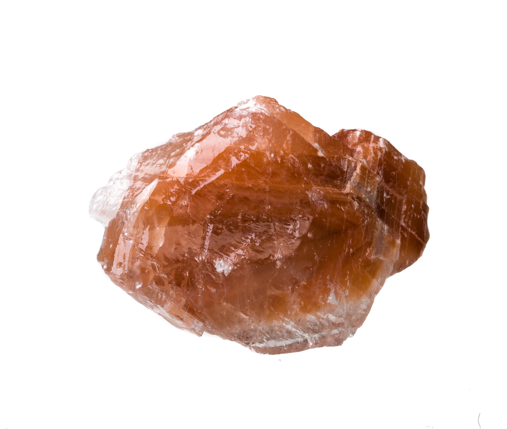 A piece of Red Calcite on a white background