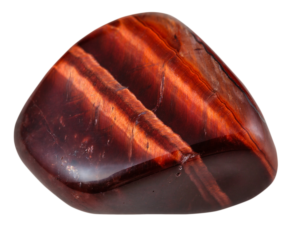 A piece of Red Tiger's Eye on a white background
