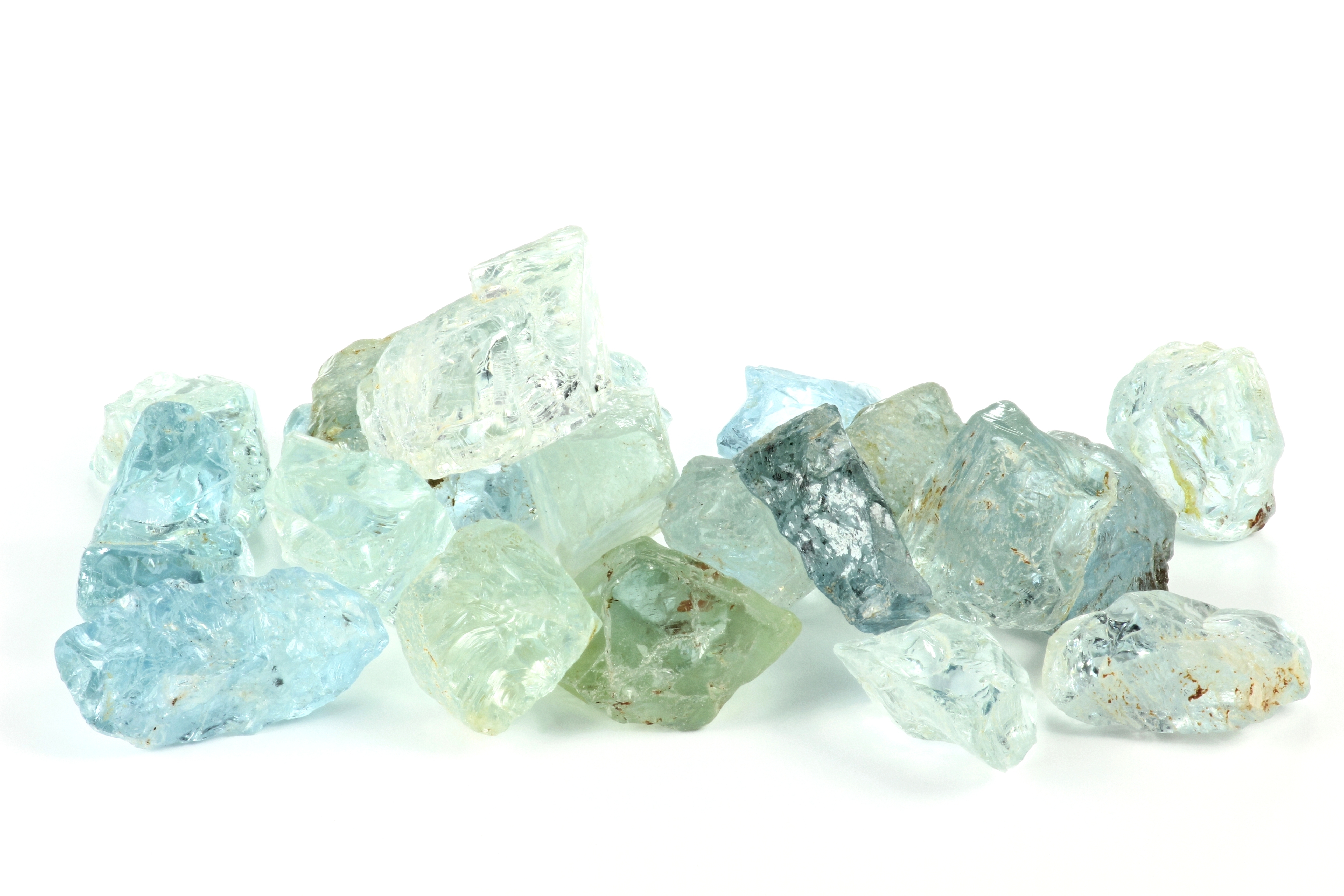 Multiple pieces of Aquamarine on a white background
