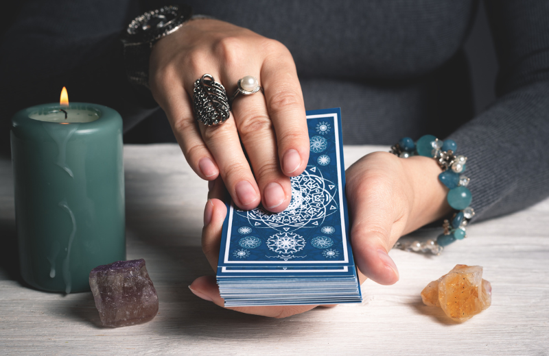 An image of someone using a tarot deck.