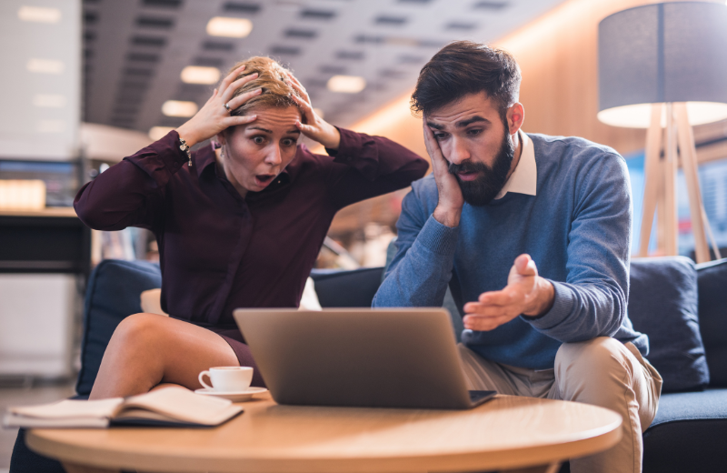 Image of a couple miscommunicating and struggling with technology.
