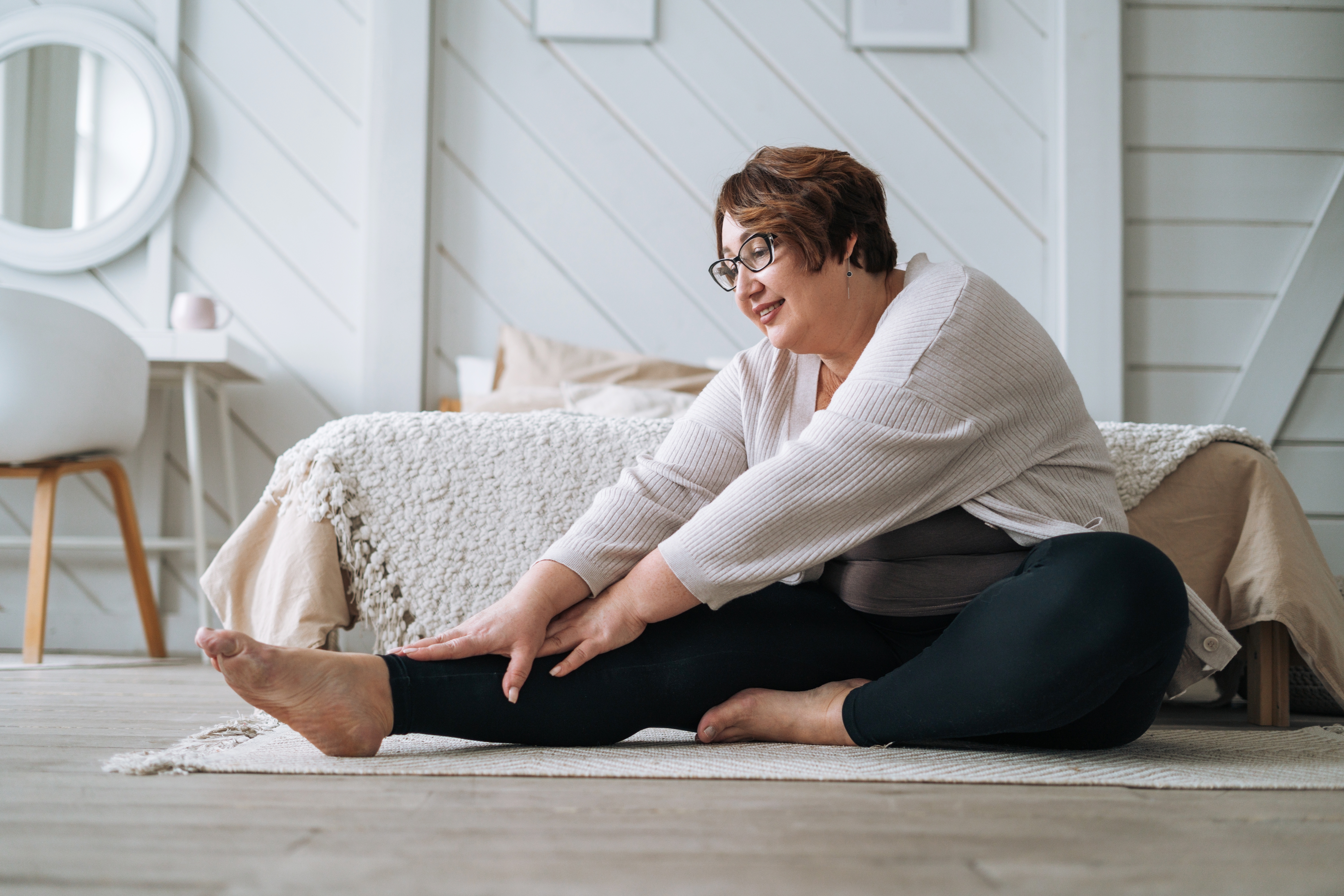 Plus sized middle-aged woman excercising