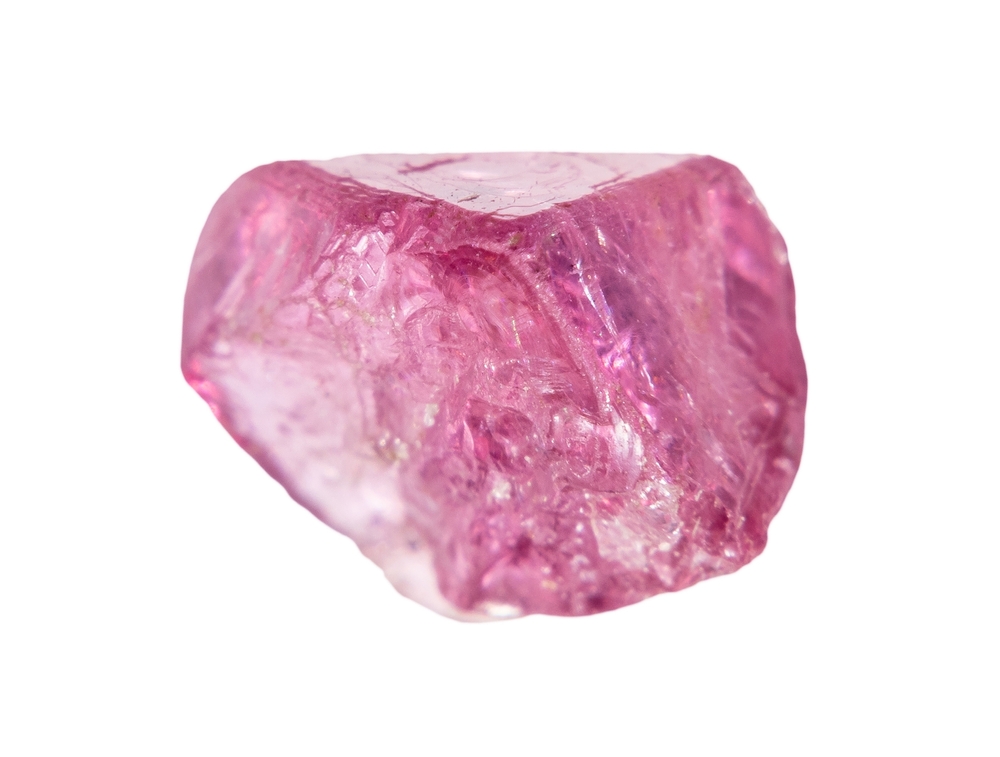 A piece of Pink Spinel on a white background