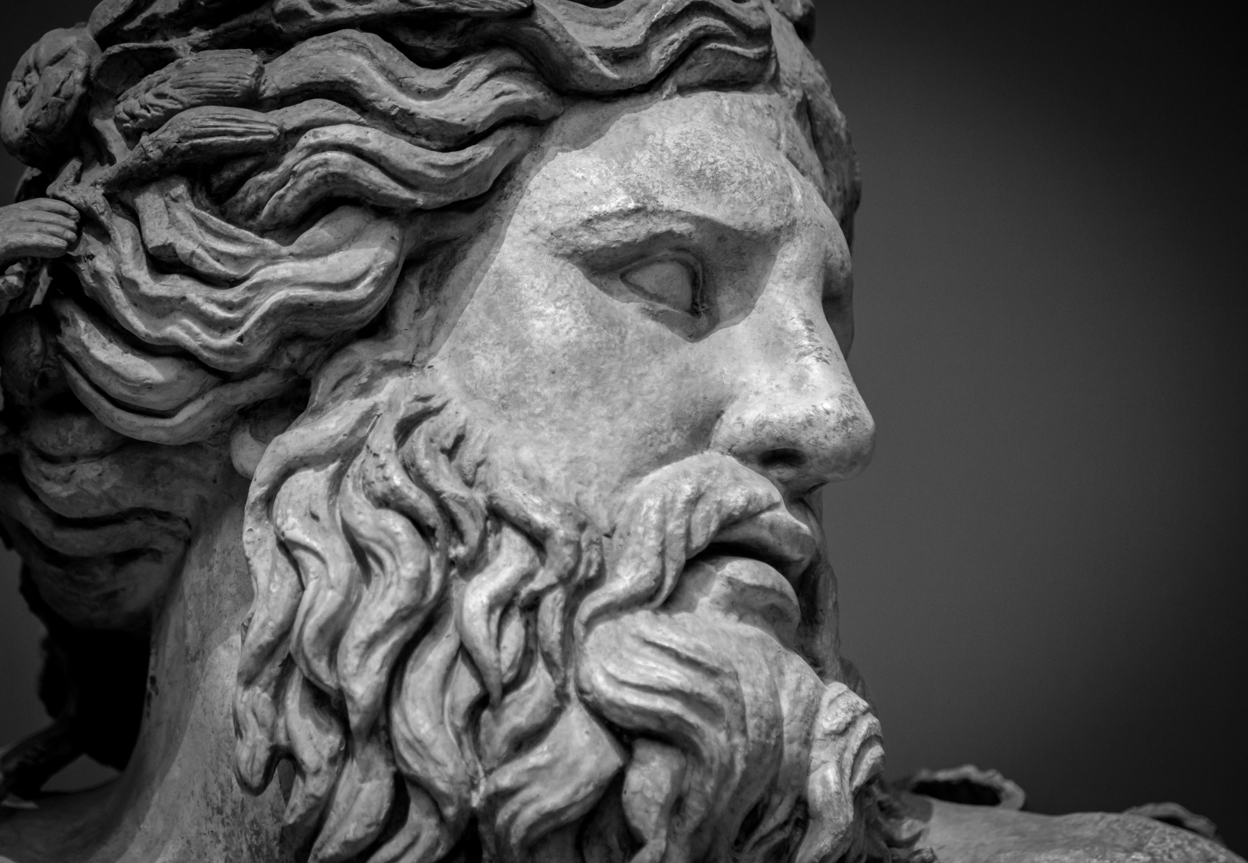 Close up of the head of a statue of Zeus