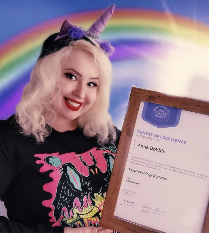 Goldy with her Cryptozoology Certificate