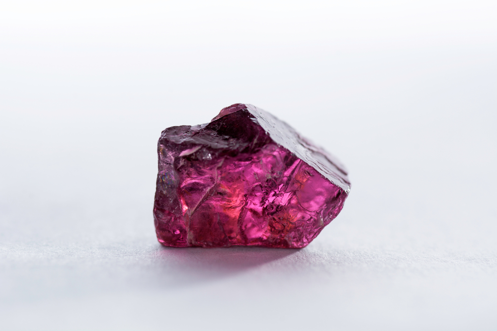A piece of Pink Garnet on a white background