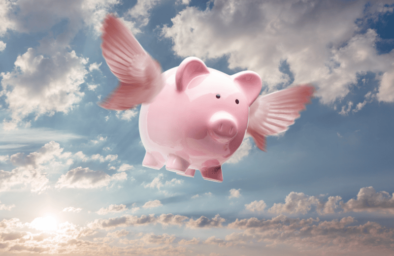 piggy bank flying in sky