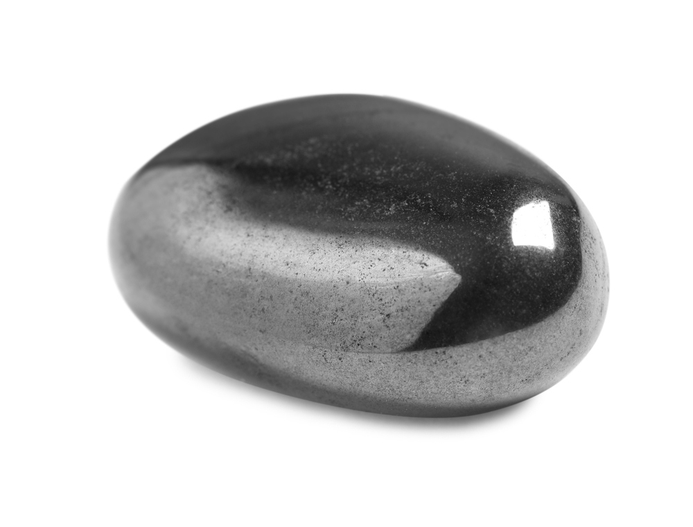 A piece of Hematite on a white background